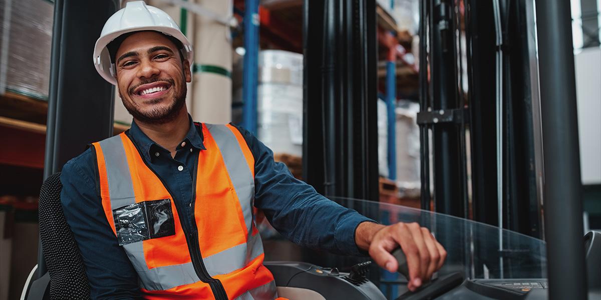 Image of man on forklift.